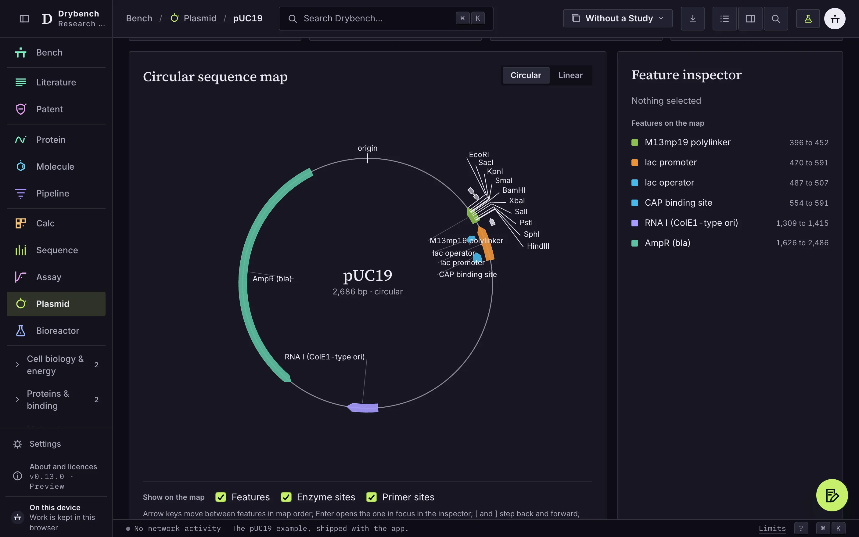 The pUC19 circular sequence map with annotated features, restriction sites and the feature inspector.