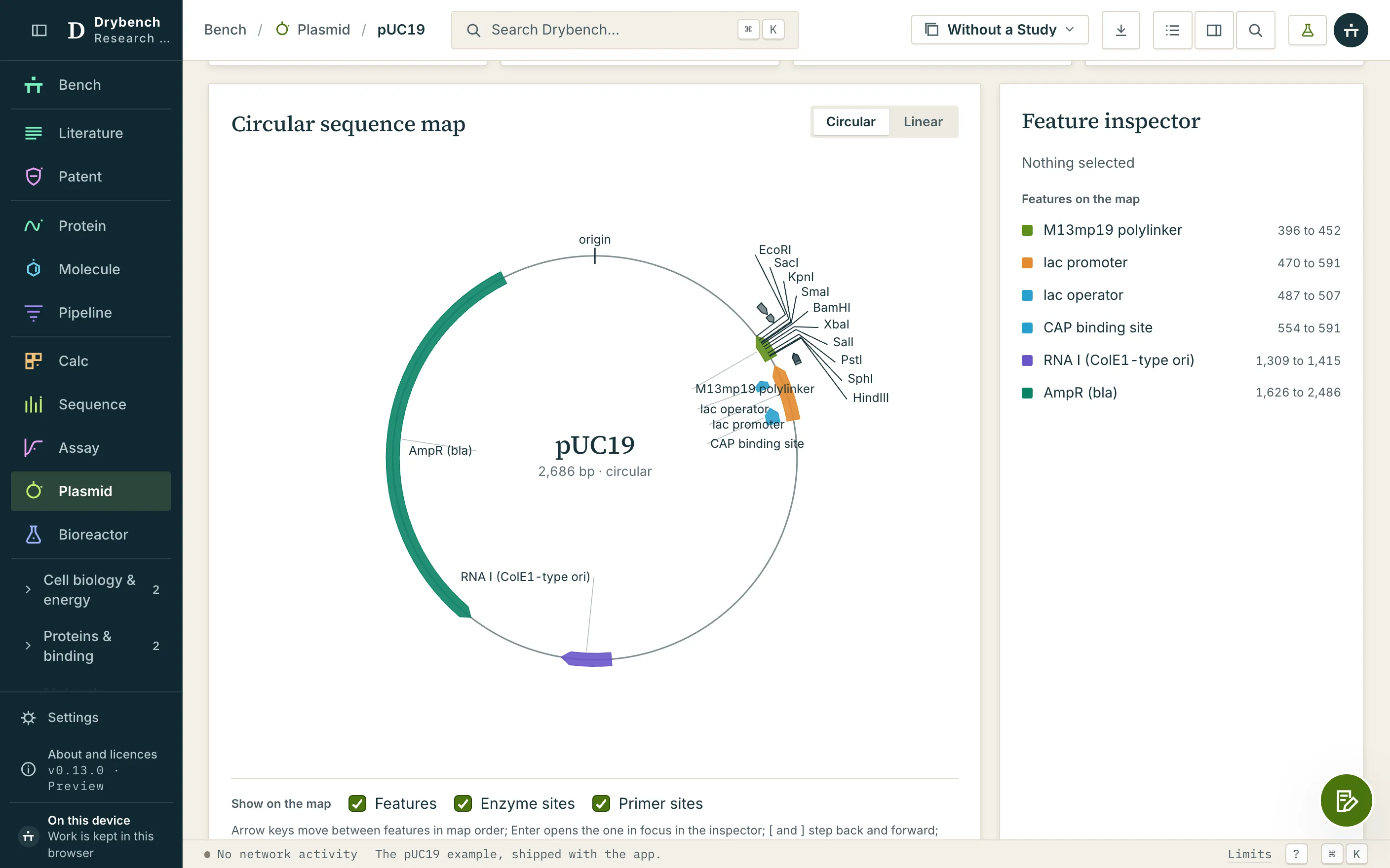 The pUC19 circular sequence map with annotated features, restriction sites and the feature inspector.